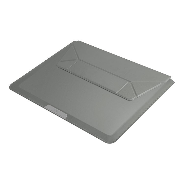 На фото изображено Чехол Uniq для ноутбуков 14" Oslo V.2 PU leather Magnetic Laptop sleeve/foldable stand, зеленый