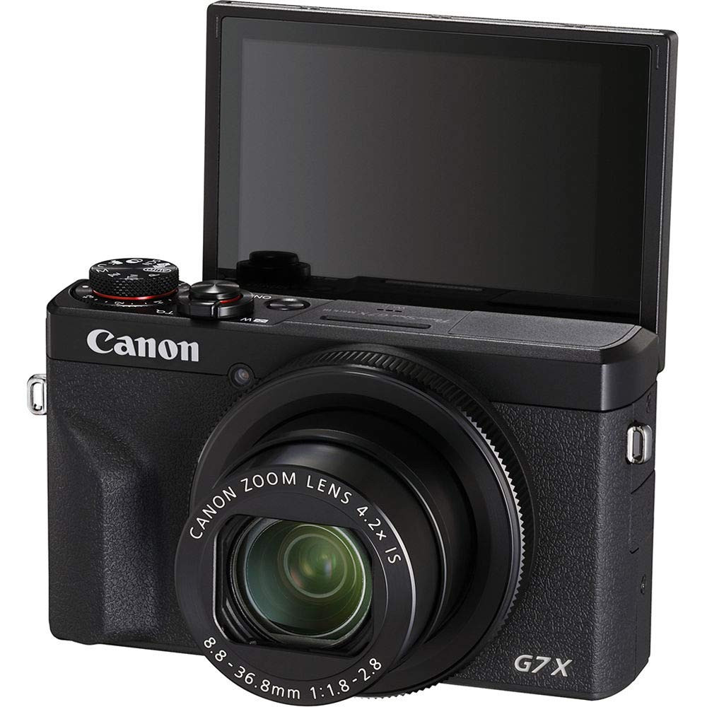 На фото изображено Canon G7x Mark III Black
