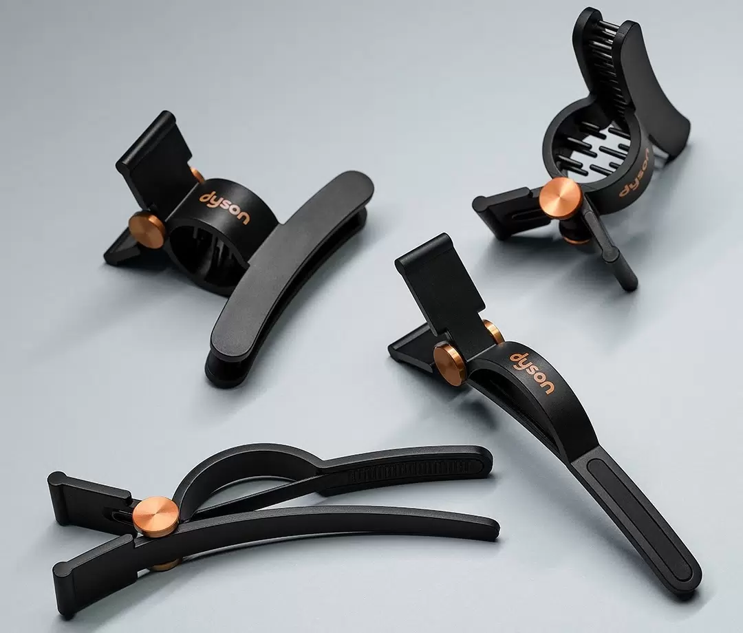 На фото изображено Заколки для волос Dyson Hair Clips, Blue/Copper