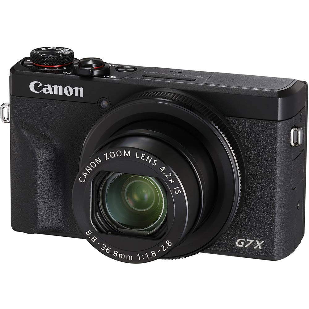 На фото изображено Canon G7x Mark III Black