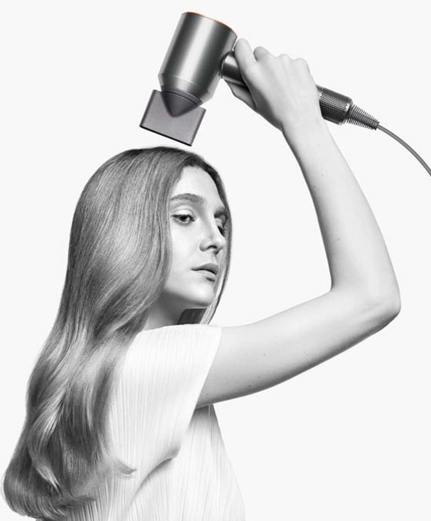 На фото изображено Фен Dyson Supersonic HD07, Nickel/Copper