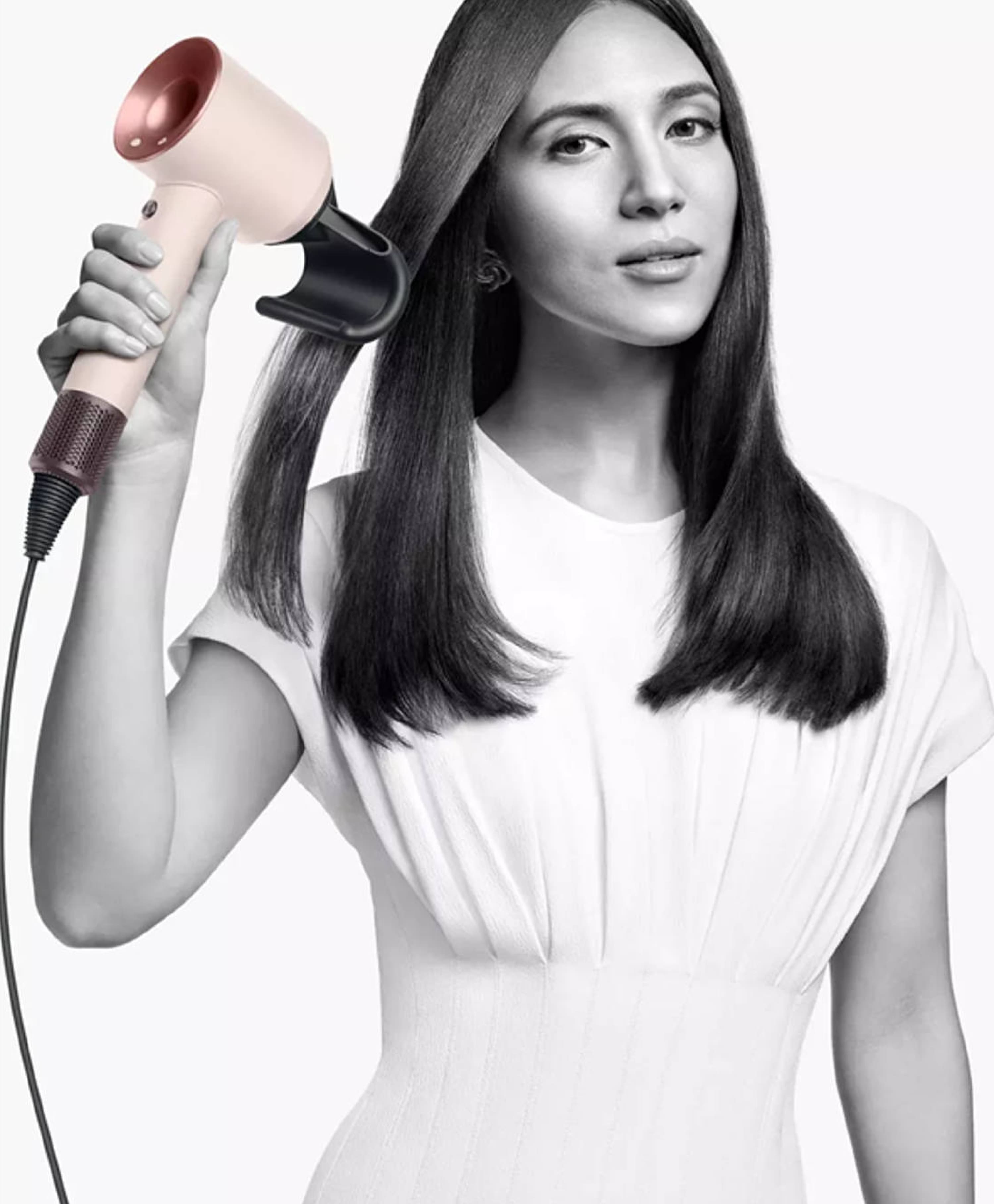 На фото изображено Фен Dyson Supersonic HD07, Ceramic Pink/Rose Gold