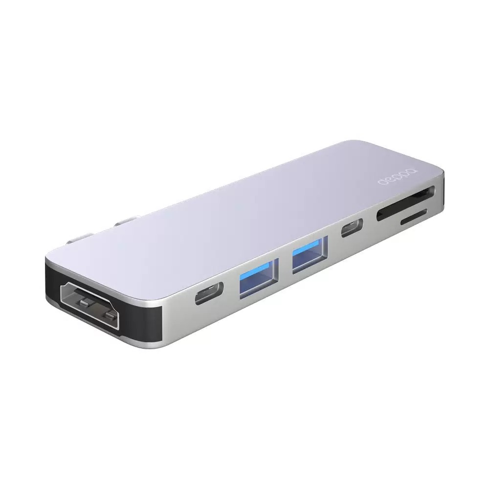 На фото изображено USB-C адаптер Deppa для MacBook 7-в-1, серебристый