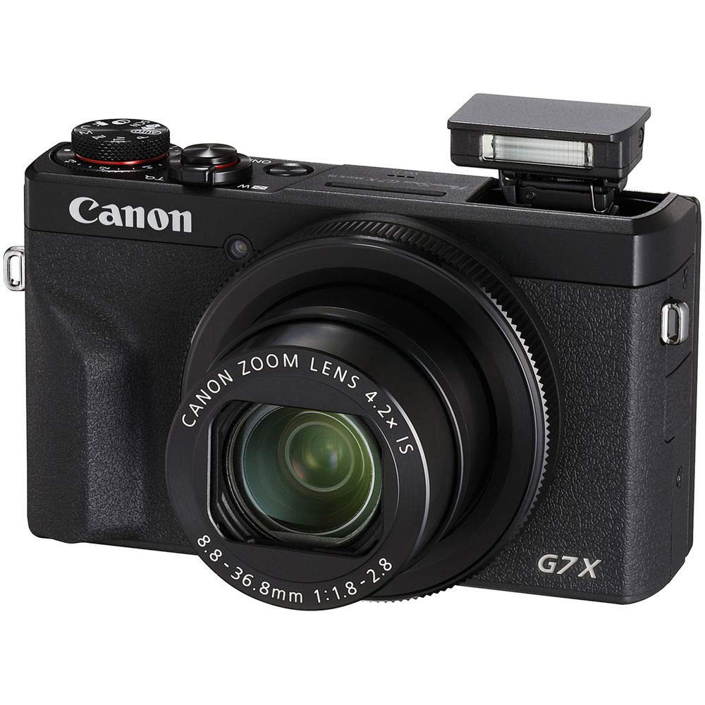 На фото изображено Canon G7x Mark III Black