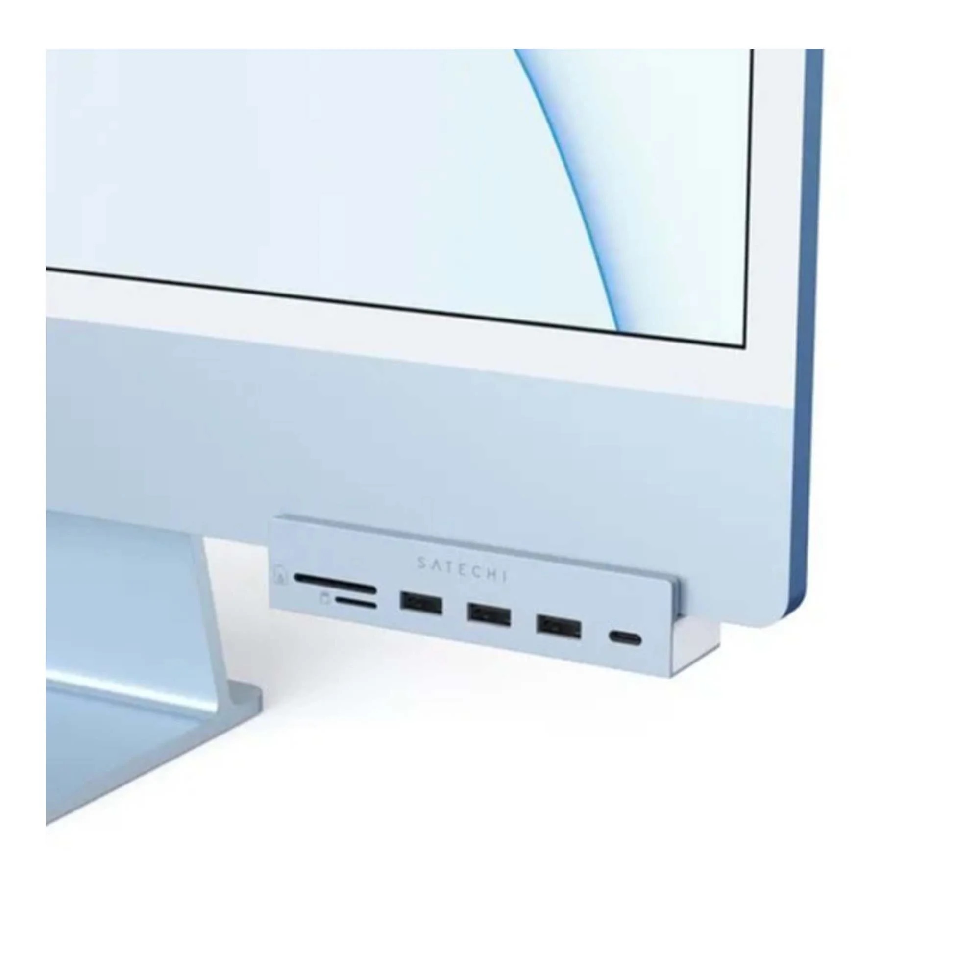 На фото изображено USB-C-концентратор Satechi Aluminum USB-C Clamp Hub для 24" iMac, синий